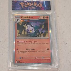 Pokemon Chandelure Trading Card - Orange and Purple